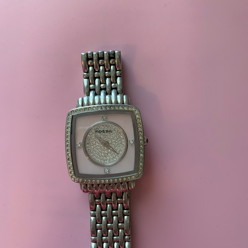 Fossil Silver Watch with pink face.